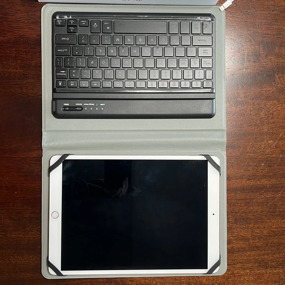 I pad pro 256 GB Wi-Fi rose gold with case, keyboard, and pencil